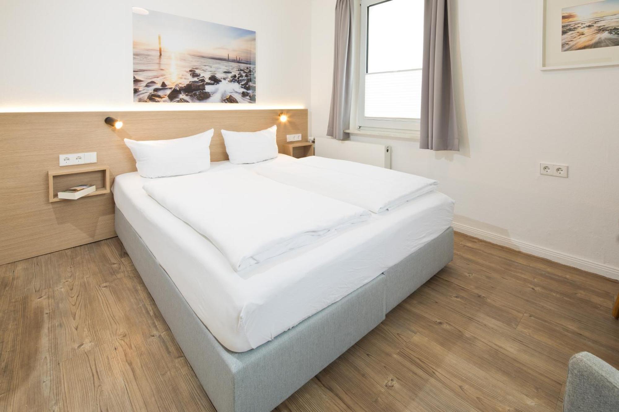 Haus Menno Janssen - Doppelzimmer นอร์เดอร์ไน ภายนอก รูปภาพ