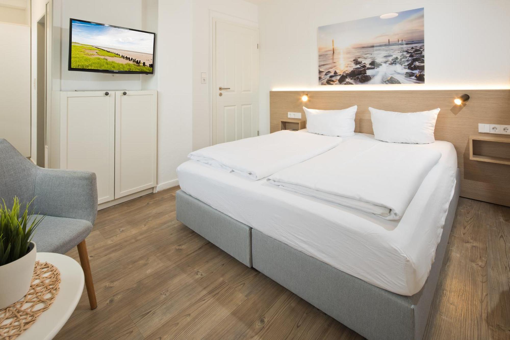 Haus Menno Janssen - Doppelzimmer นอร์เดอร์ไน ภายนอก รูปภาพ